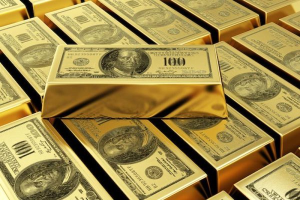 Gold soars dollar surge