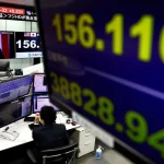 Asia Markets Edge Lower on U.S. Tariffs, Fed Watch