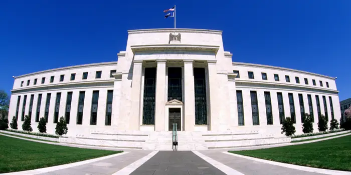 Fed Cuts Rates, Leaves Door Open for More