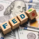 Fed Rate Hold Fuels Dollar Amid Global Market Volatility