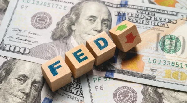 Fed Rate Hold Fuels Dollar Amid Global Market Volatility